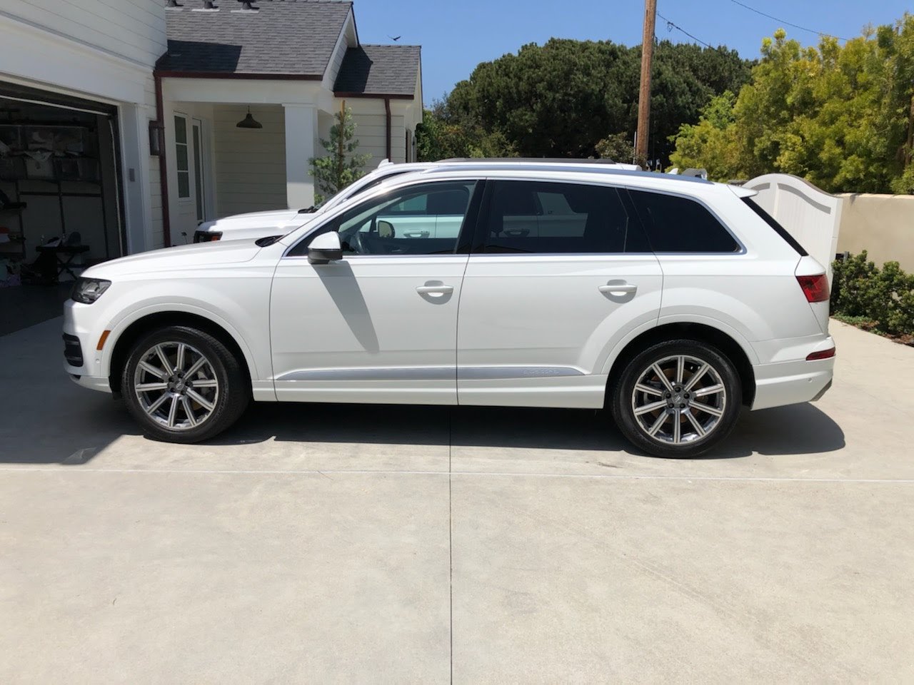 Audi Q7 side profile gleaming after a mobile hand wash and exterior detail