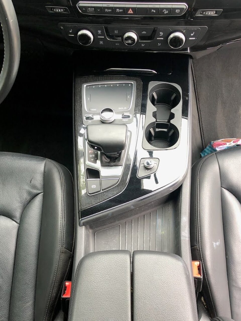 Same center console spotless after an interior car detail in San Diego