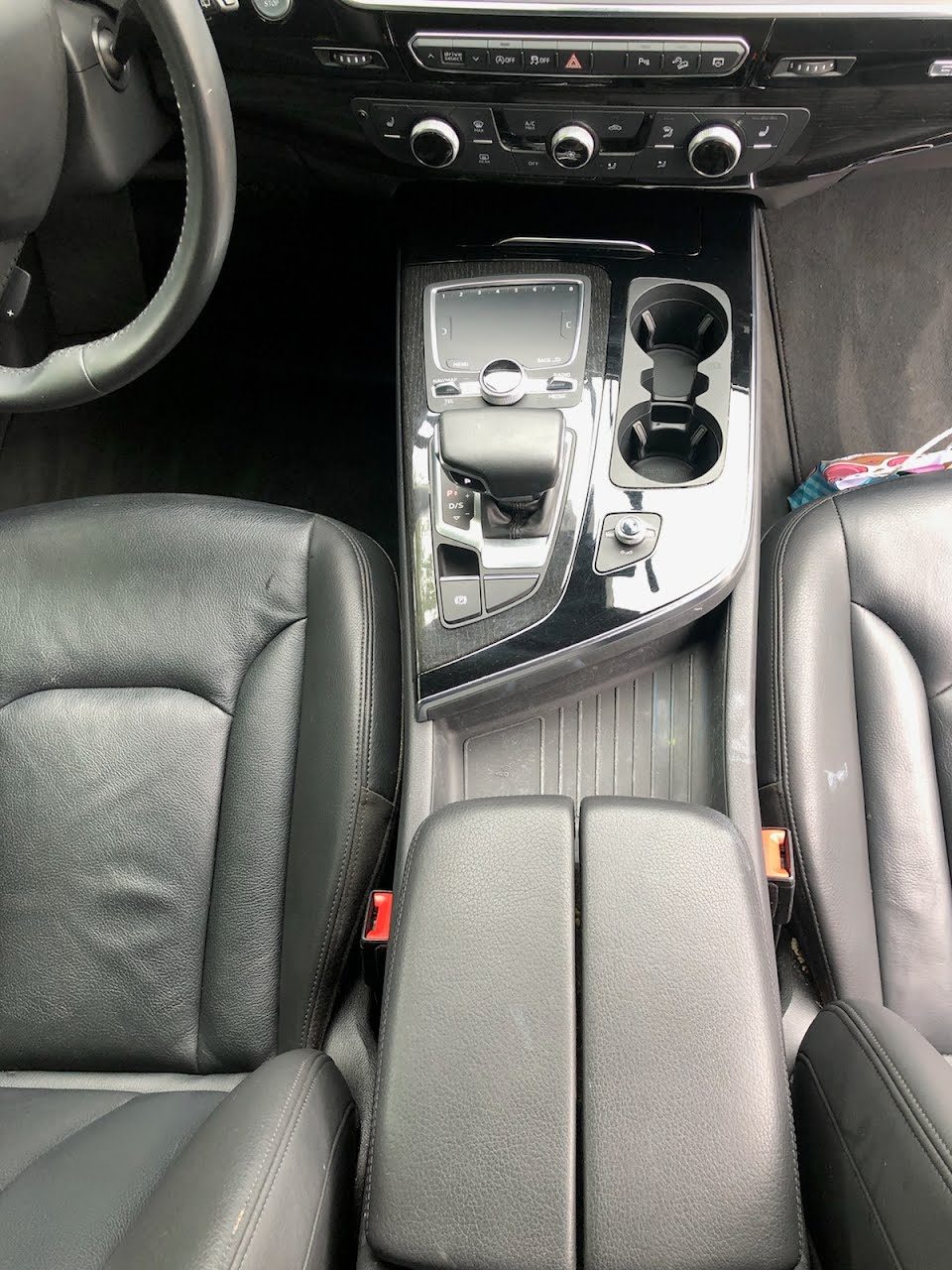Same center console spotless after an interior car detail in San Diego