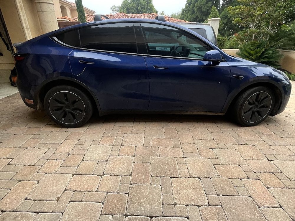 Blue Tesla Model Y after a mobile exterior detail